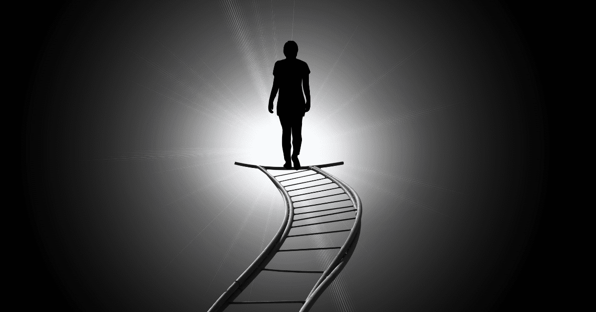 black and white photo of person on top of ladder representing traits of successful Heating and Air Companies
